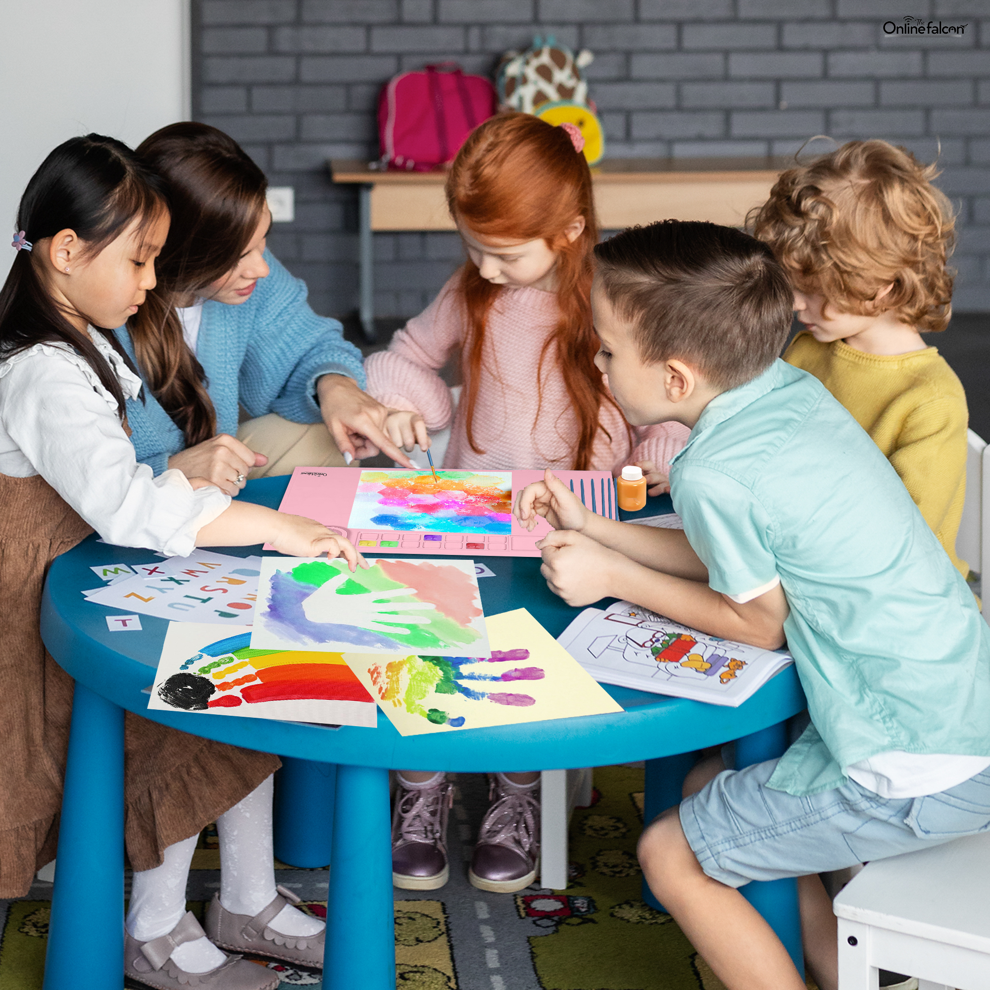 Children engaging in art activities at a round table.